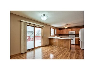 PELLA SLIDING DOOR TO DECK WITH STAIRS