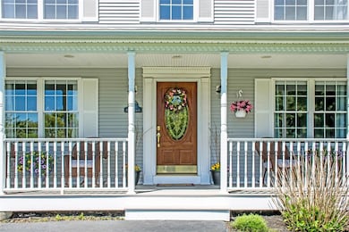 Enjoy sitting on this large, cool front porch.