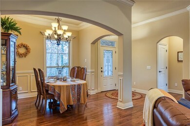 The natural light fills the room and shines across the gorgeous wood floors.