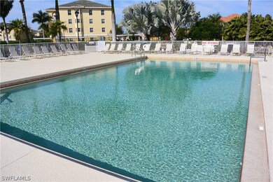 Community pool overlooks lush grounds!