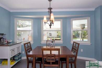 Sunny breakfast area in kitchen with view to backy