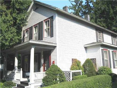 Exterior Front. Side view with coveredfront porch.