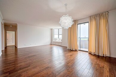 Spacious living area with hardwood
floors, modern