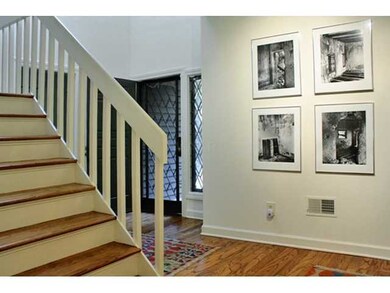 Front door and stairway. Kitchen is to the right a
