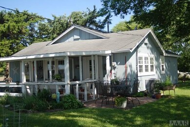 Front porch and side view with patio