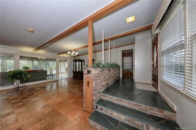 View from living area towards family room/sun room