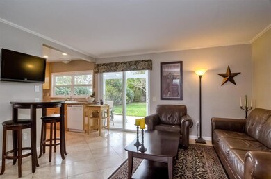 Sliding glass door to beautiful private, fenced backyard