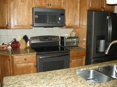 Lovely cabinetry, granite counters and up-market a