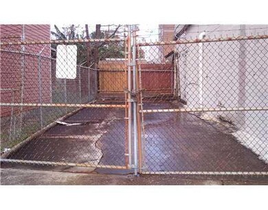 Photo. PARKING AREA IN BACK/ SIDE AREA.  MAY ACCOM
