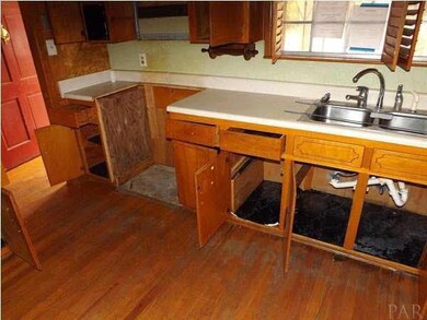 Notice the hardwood floors