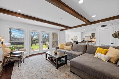 Living area with visible vents, plenty of natural