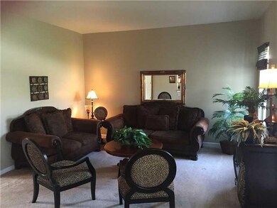 Family Room. family room opens to kitchen & breakfast area and leads to screened porch