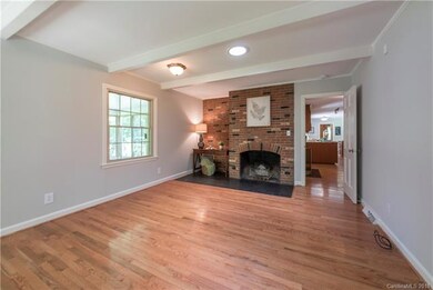 Spacious family room/den located off kitchen at th