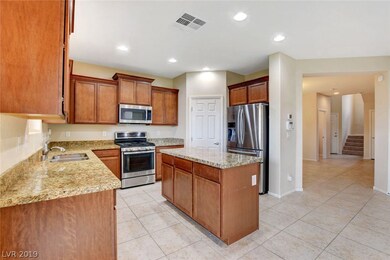 Beautiful kitchen with upgraded sliders in cabinet