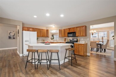 Kitchen with recessed lighting, center island with