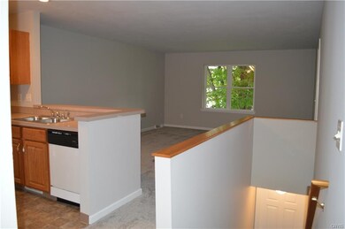 kitchen opens up into the living room