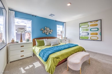 Bedroom with carpet and baseboards. Photo is representational only; actual home finishes may vary.