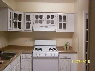 Kitchen. Looking at new stove and vent f
