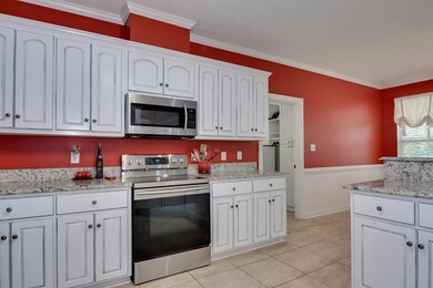 Kitchen boasts numerous cabinets