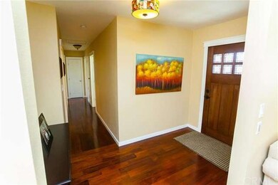 Enter through the gorgeous Craftsman style front d