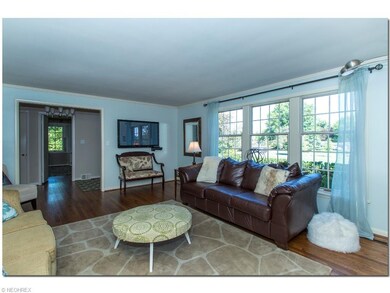 Spacious Living Room with Hardwood Floors and     