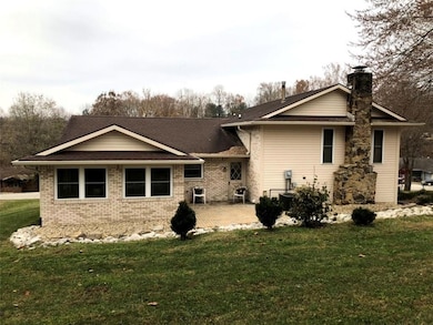 Enjoy bird watching or the winter scenery from the sun room while you contemplate the summer fun on the patio.