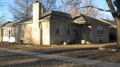 All brick ranch with 2 car attached garage.