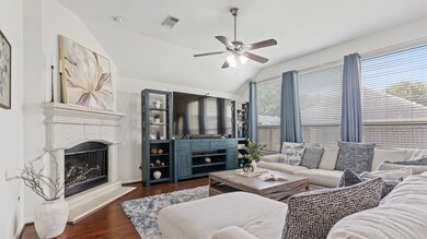 The beautiful living room & upgraded gas fireplace