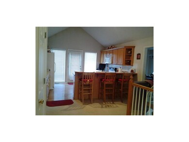 KITCHEN AND BACK EXIT OUT TO DECK AND BACK YARD