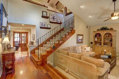 Beautiful entry with step down living room....