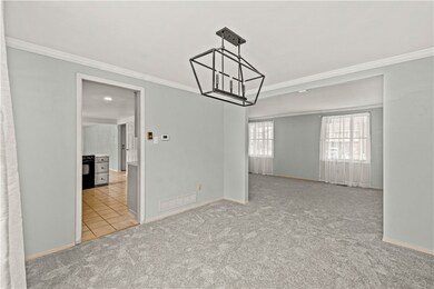 Great chandelier, fresh carpet and paint