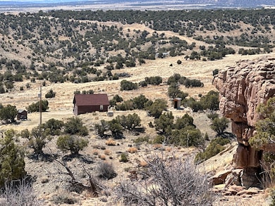 Property view of mountains with a rural view