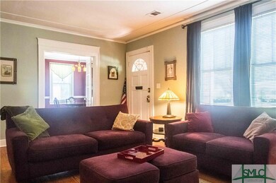 Spacious living room that leads to the dining room