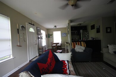 Living room with plenty of natural light, ceiling