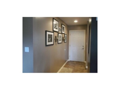 Front door and entry way looking from living room