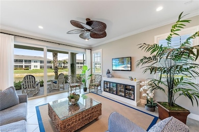 Living room featuring ornamental molding, ceiling 