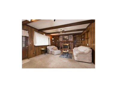 Family room with fireplace and walkout
