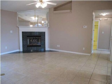Hallway to your right leads to the 2 additional bedrooms & full bath. This view is from the dining room.