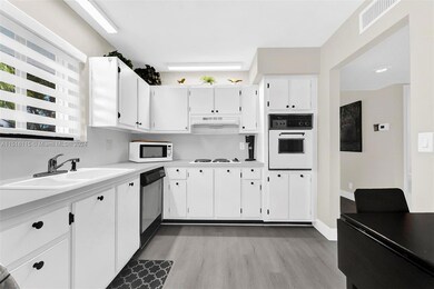 16274 Laurel Dr unit 201, Weston, FL 33326 - photo 7