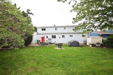 Rear view of house featuring a patio area