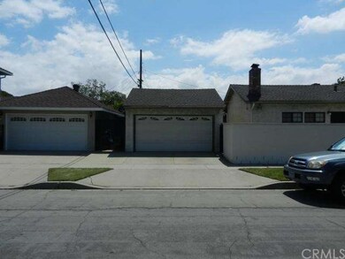 Front of huge garage, regular 2 car with room for 