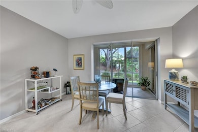 Tiled dining area with ceiling fan