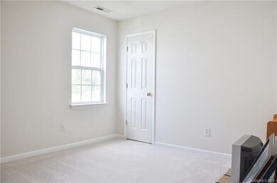Bright and spacious secondary bedroom.