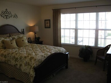 2nd bedroom: image similar to finished home.