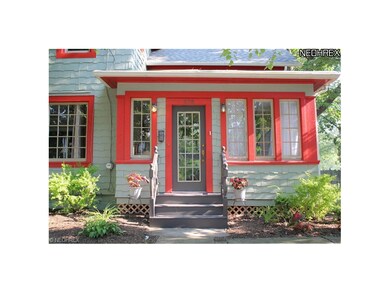 Great enclosed front porch for enjoying sunshine a