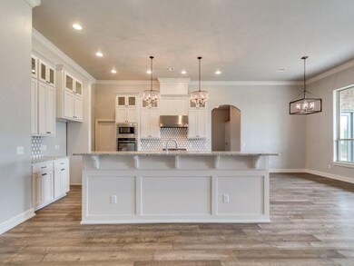 Kitchen – photo is of a similarly finished builder