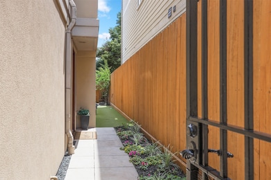 Private entrance with a neatly landscaped garden a