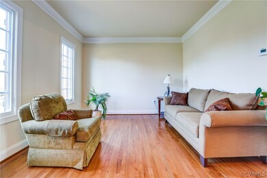 Formal living room opens to the foyer.