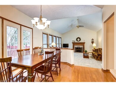 Breakfast area with newer Chandelier.  Step outsid