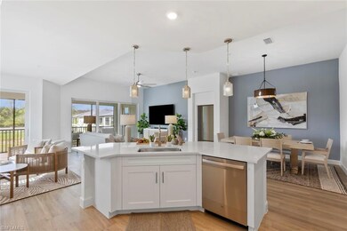 Kitchen featuring light wood-type flooring, white 